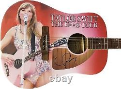 Taylor Swift a signé une guitare personnalisée Eras Tour avec des graphismes autographiés Fs 41 et un certificat d'authenticité